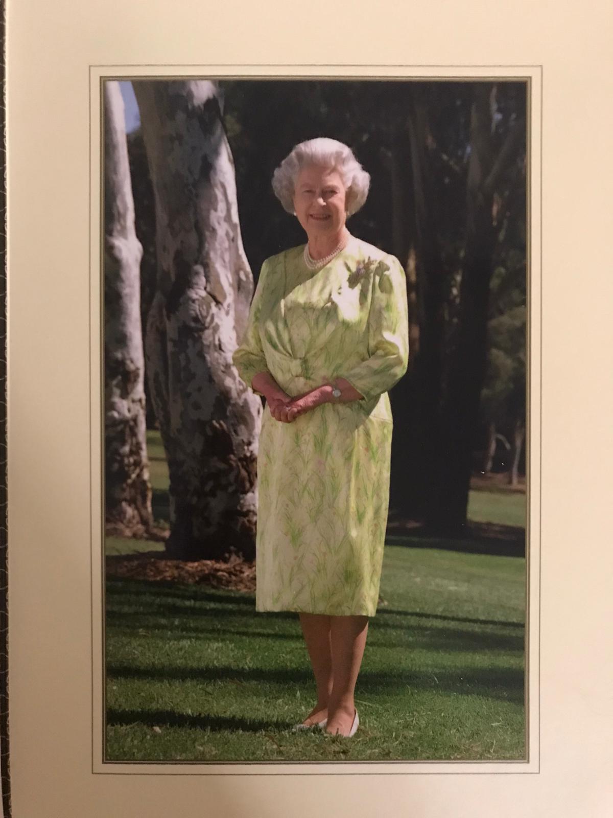 Portrait picture of Queen Elizabeth II afixed with Aliya begum's birthday card