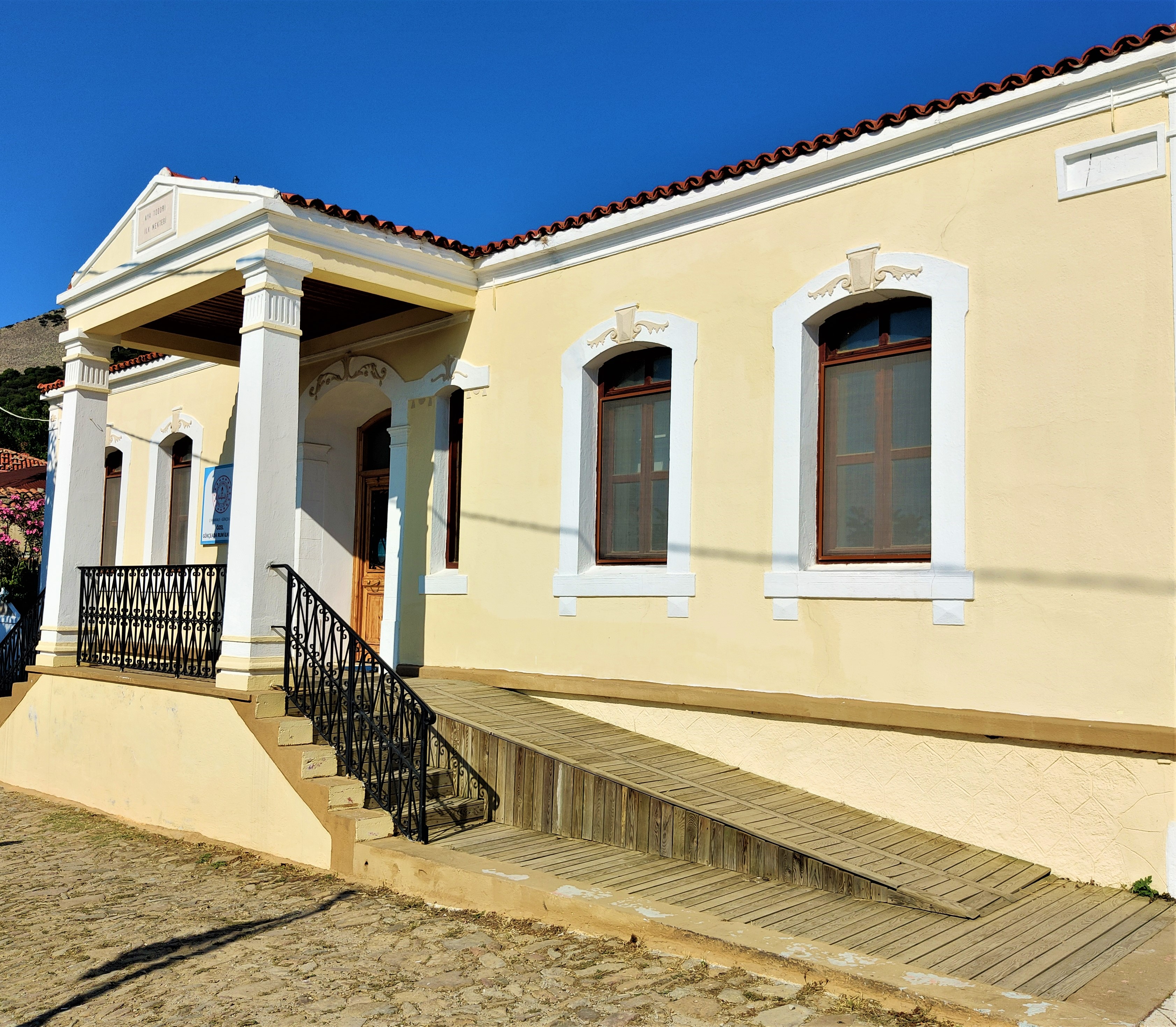 The Greek school at Agioi Theodoroi. Greek schools have begun reoperating on the island after a 50 year absence 