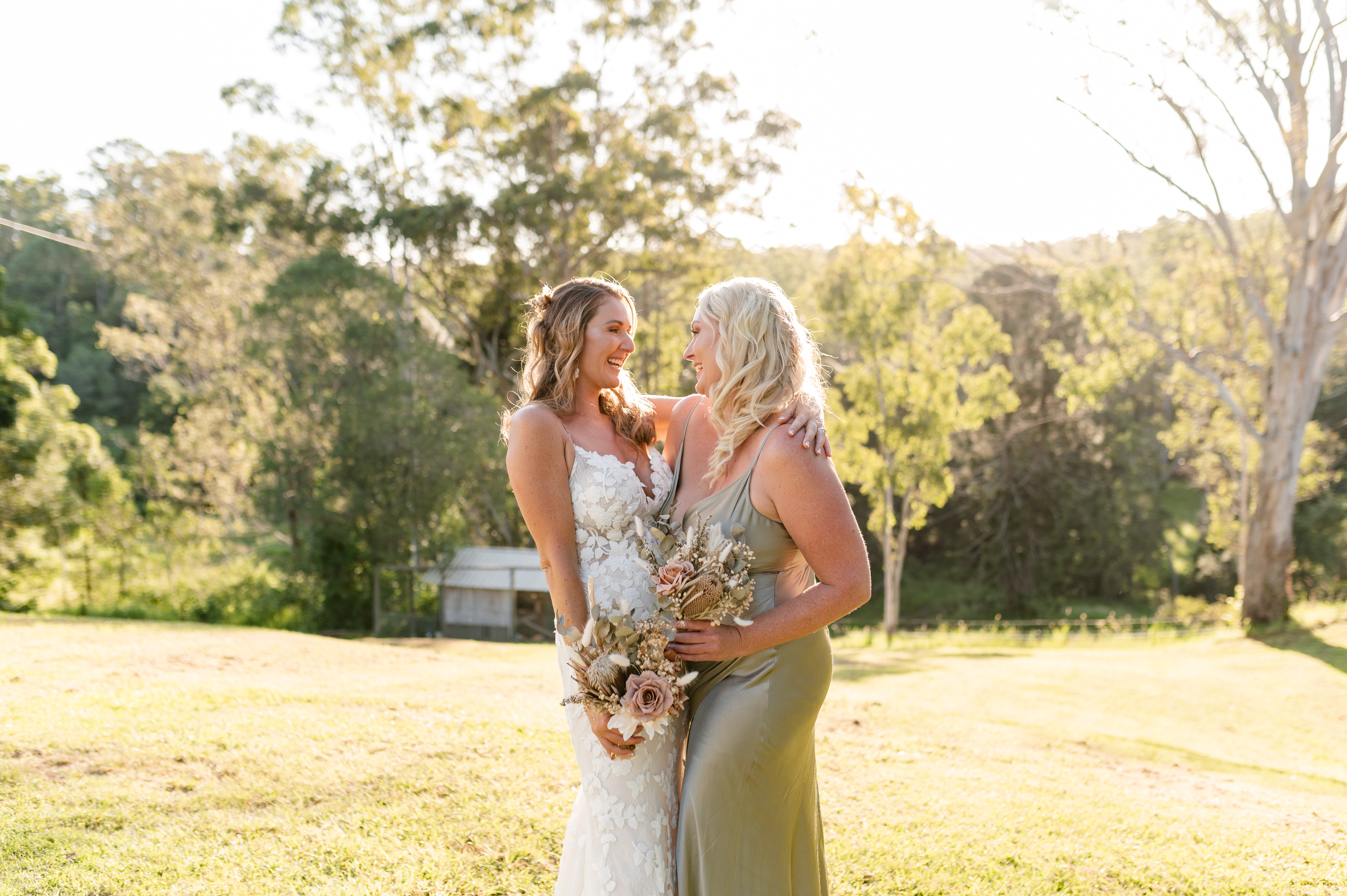 Two women embracing outside