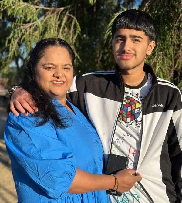Ranju Regmi (L) with her son.
