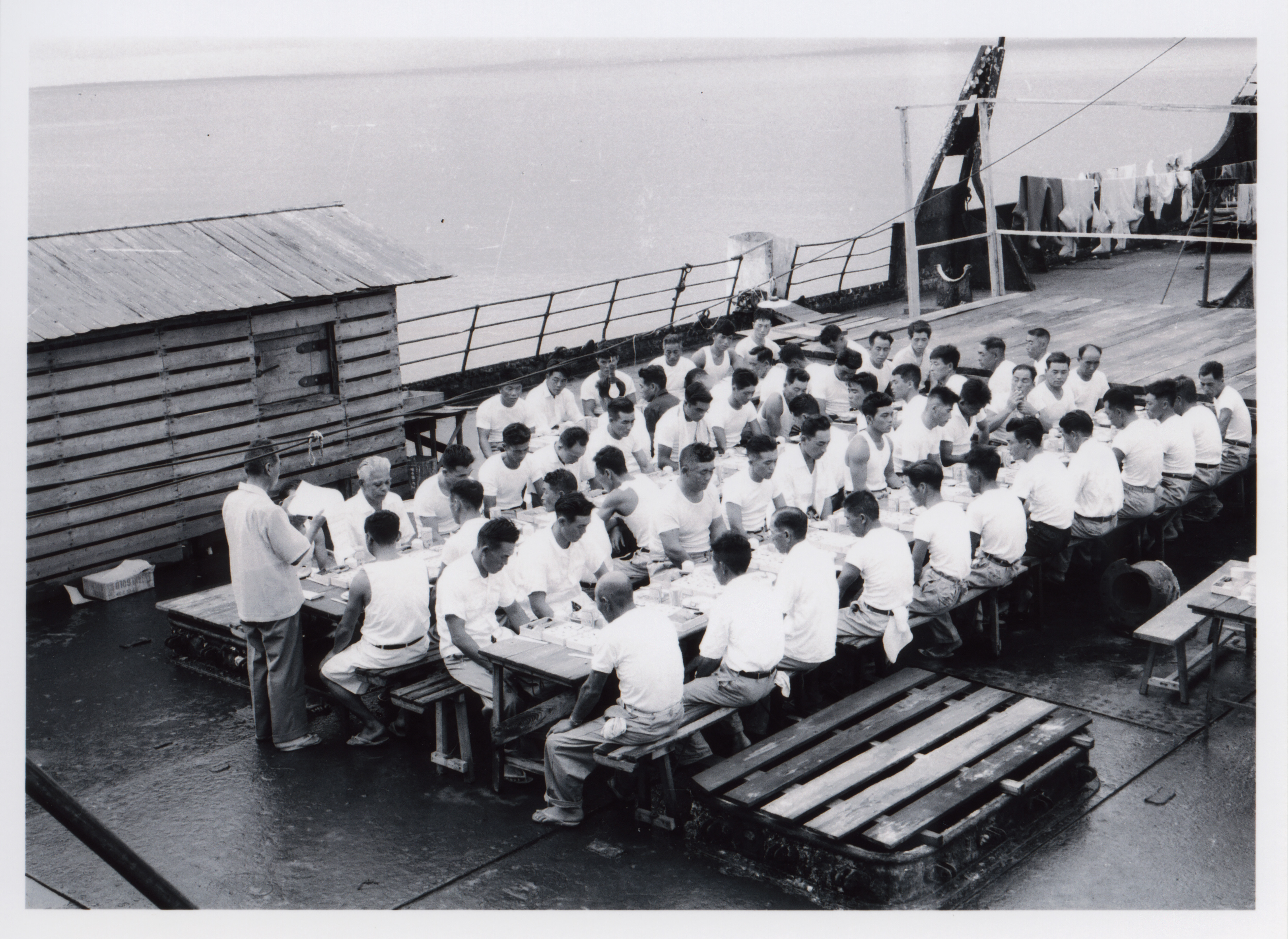 Employees of the Fujita Salvage Company celebrate New Year’s Day on board the MV British Motorist, 1961