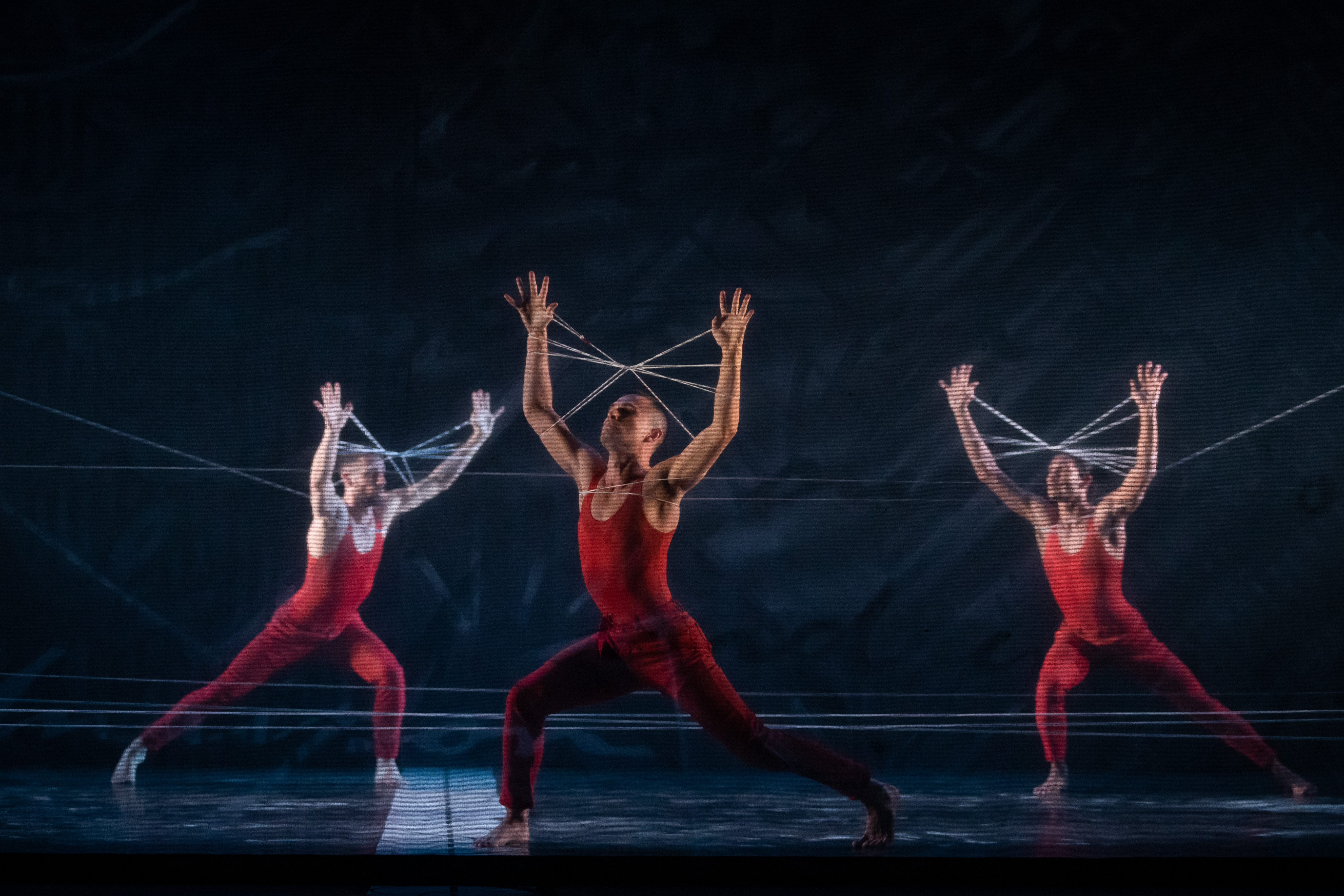 Baden Hitchcock (centre) dances in the new show, 'Bangarra: 30 years of sixty five thousand'.