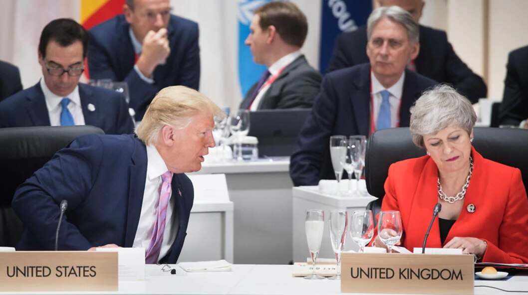 President Donald Trump chats with British Prime Minister Theresa May at the G20.