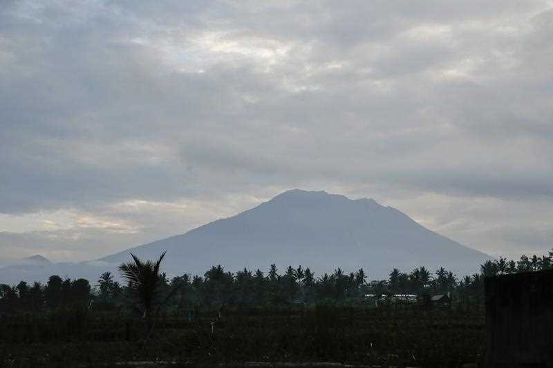 Mount Agung is seen from a nearby village in Karangasem, Bali, Indonesia, 24 September 2017. The Center for Vulcanology of Geological Hazard Mitigation (PVMBG) raised the alert level of Mount Agung to the highest level on 22 September.