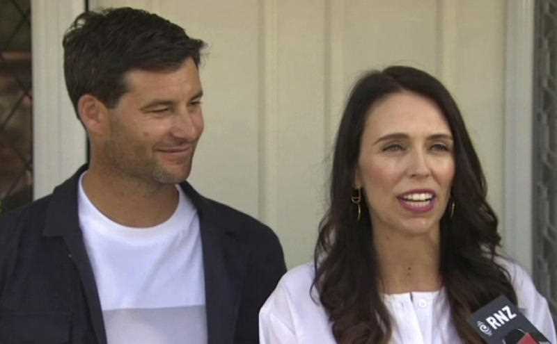 New Zealand's Prime Minister Jacinda Ardern, right, with her partner Clarke Gayford