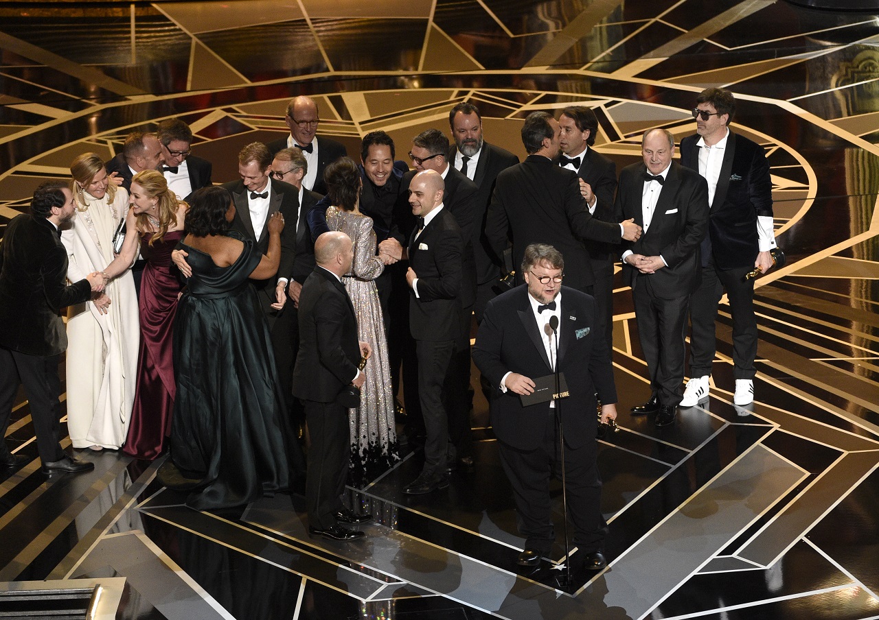 Guillermo del Toro and the cast and crew of "The Shape of Water" accept the award for best picture at the Oscars.