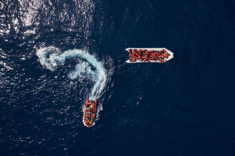Migrants are rescued in the Mediterranean Sea. 