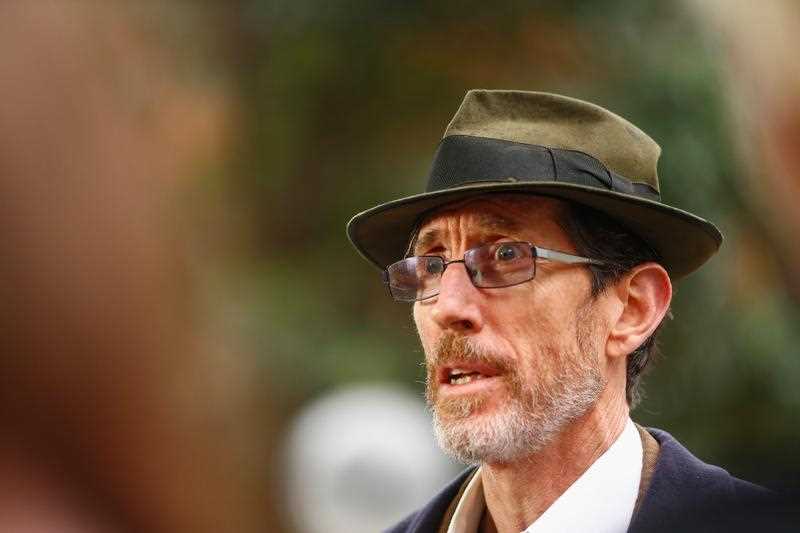 Plaintiff John Ellis speaks during a press conference in Sydney in June.