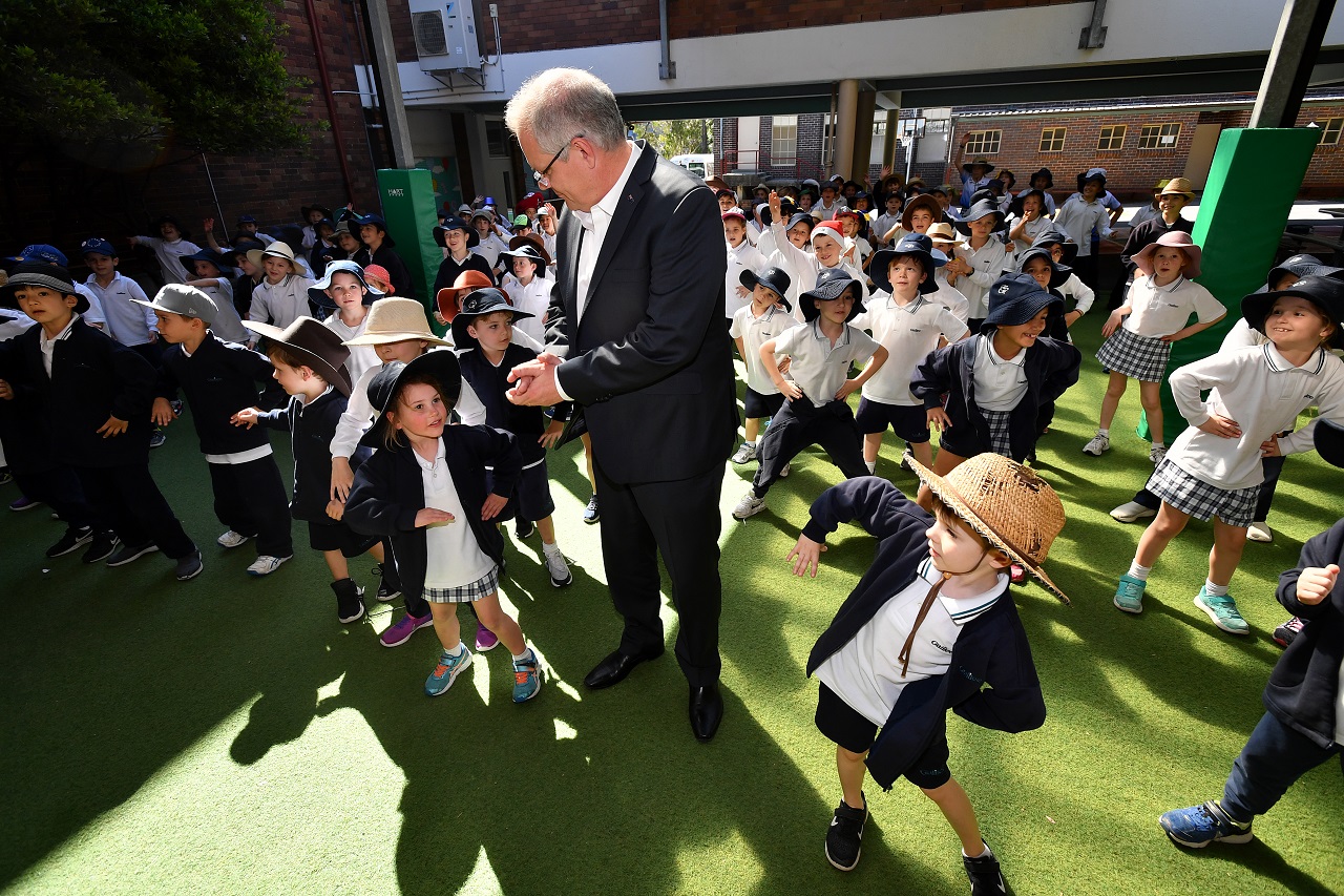 Prime Minister Scott Morrison and students from Galilee Catholic Primary School.