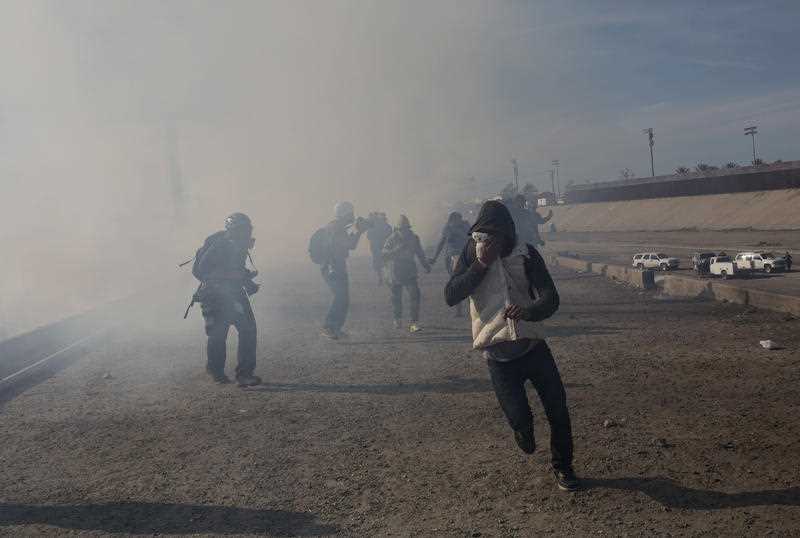 US authorities use tear gas to disperse Central American migrants gathering at the border.  