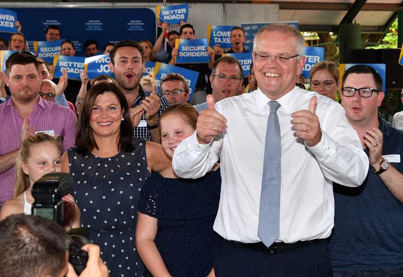 Prime Minister Scott Morrison and wife Jenny after the Liberal National Party campaign rally in Brisbane.