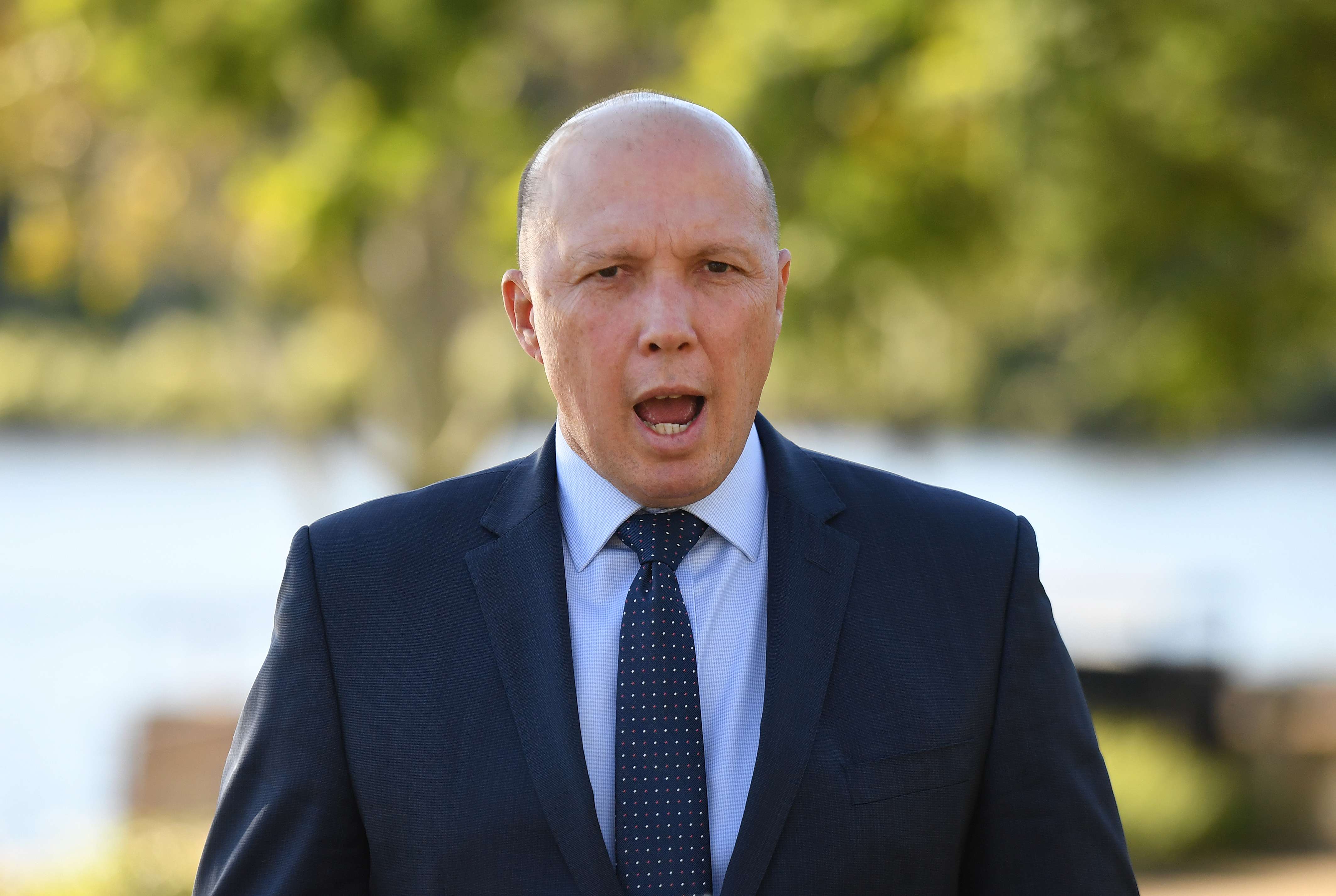 Minister for Home Affairs Peter Dutton speaks to the media in Brisbane, Thursday, May 30, 2019. Mr Dutton was asked about a recent interception of an asylum seeker boat.