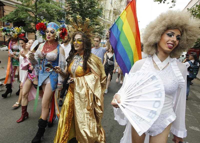Participants march on the streets during a Gay pride parade or March of Equality in down town Kiev