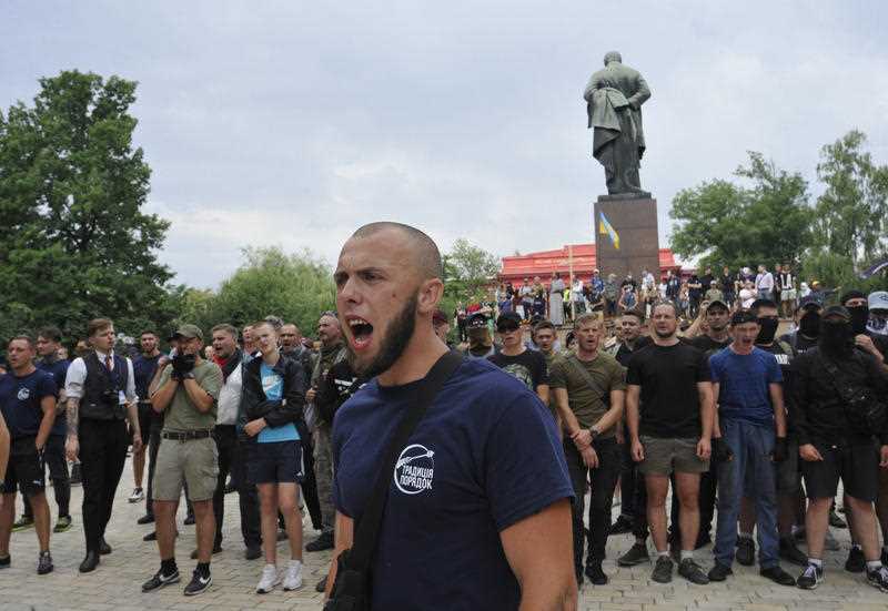 A Ukrainian ultra nationalist activist chants slogans during a protest against the annual Gay Pride parade in Kiev.