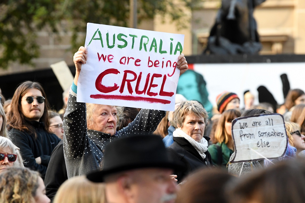 Protesters mark six years since offshore detention on Manus and Nauru was implemented.