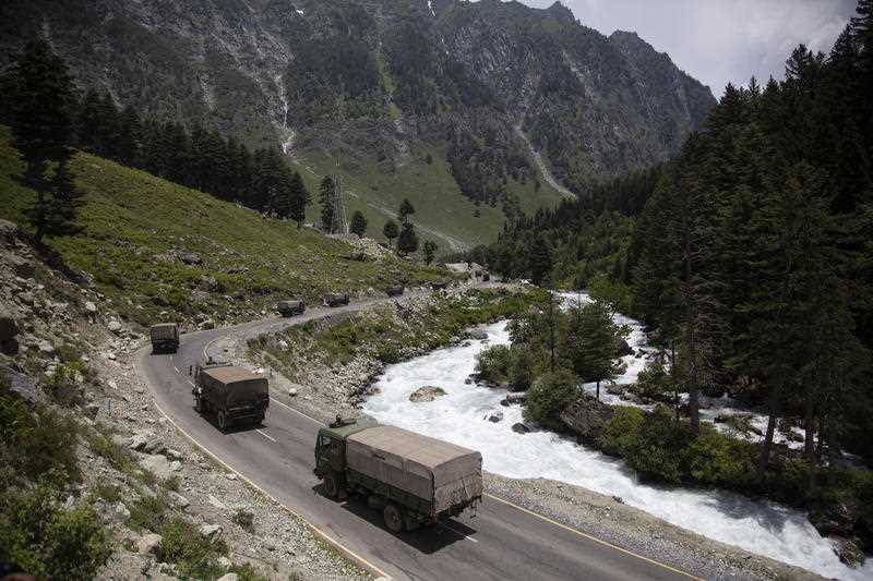 An Indian army convoy moves on the Srinagar-Ladakh highway at Gagangeer, north-east of Srinagar, India on 17 June, 2020.
