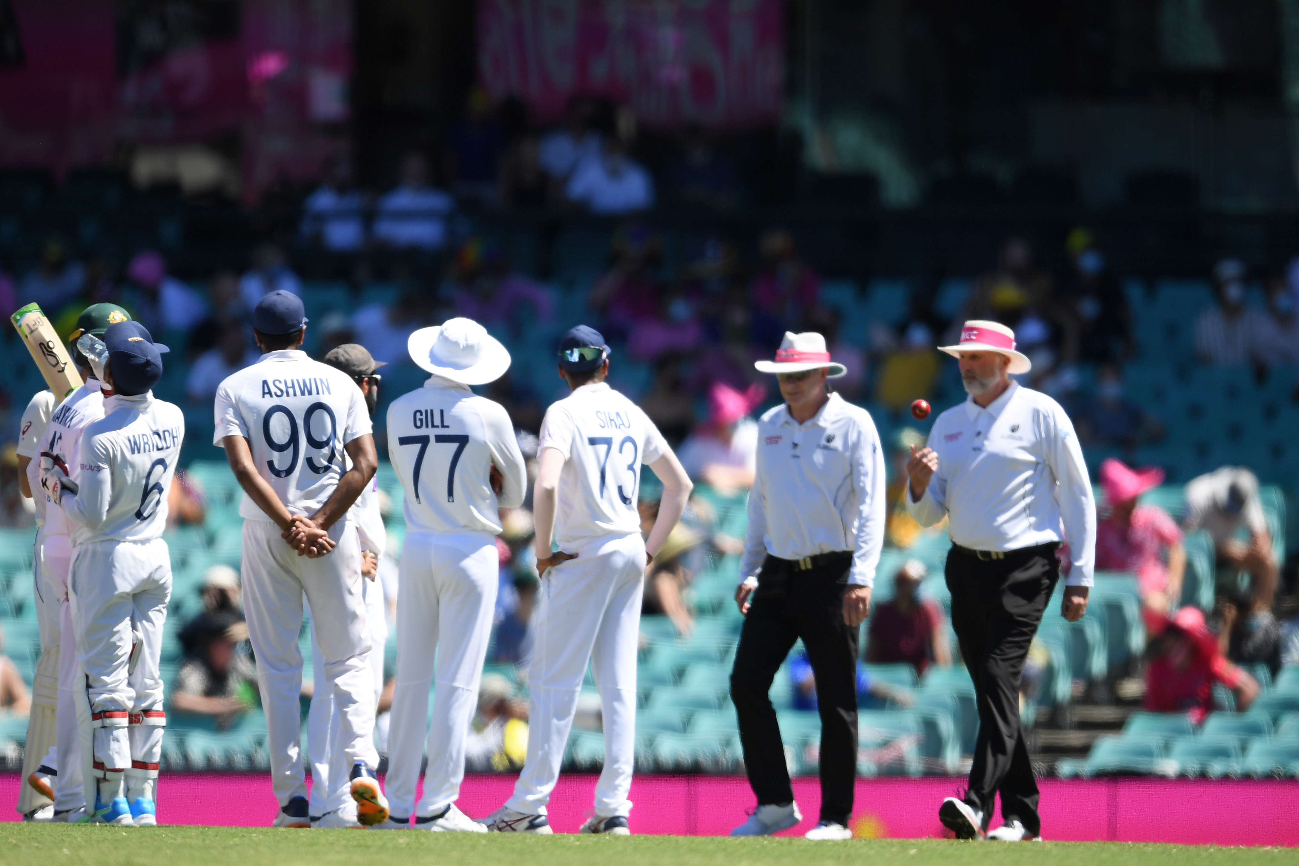 Mohammed Siraj and his Indian team mates complain to umpires of being racially abused by a group of spectators  at the SCG, Sydney, Sunday, 10 January, 2021. 