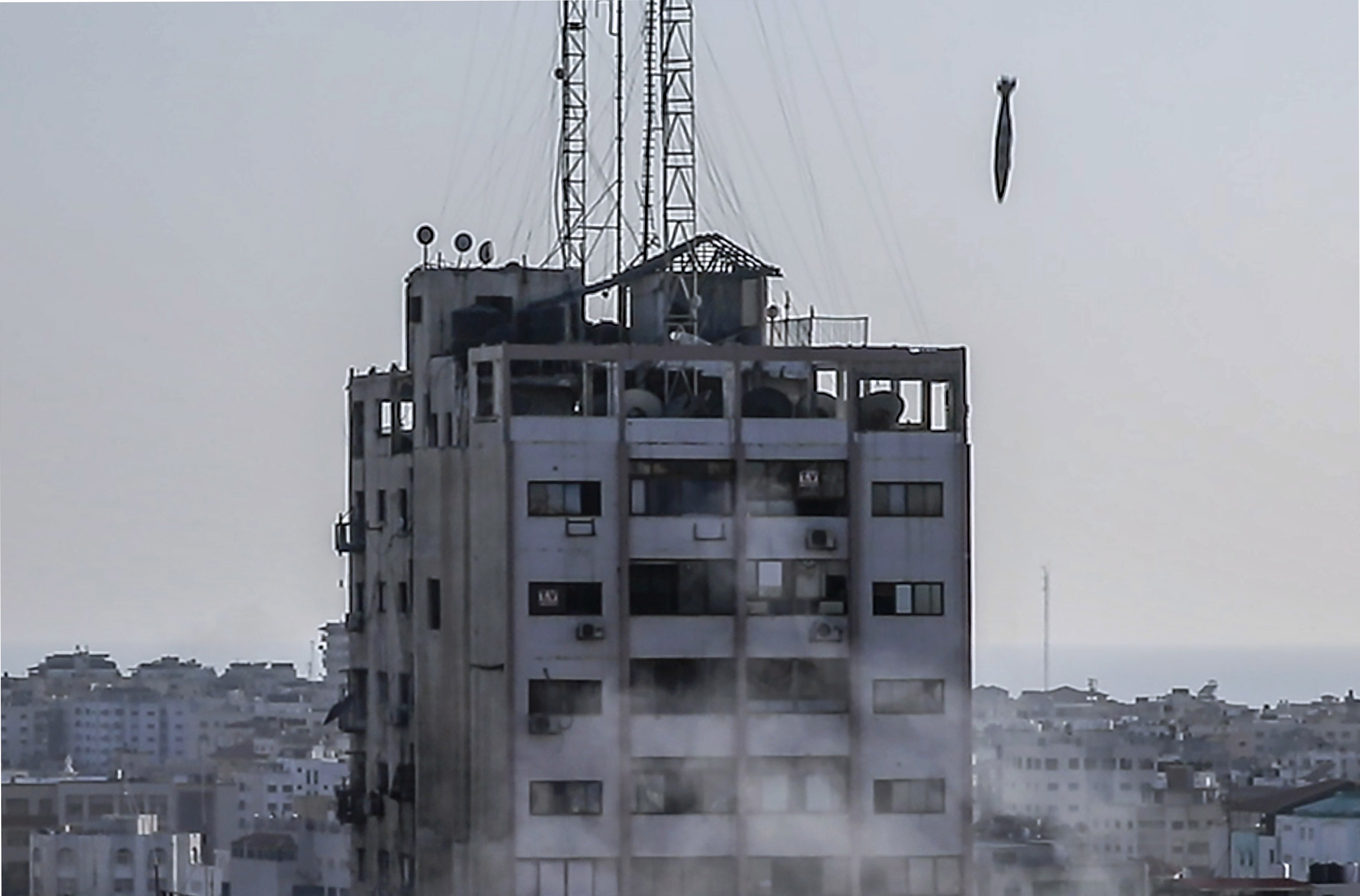  A view during an Israeli strike on Al-Shorouq tower in Gaza City, 12 May 2021 (issued 13 May 2021).