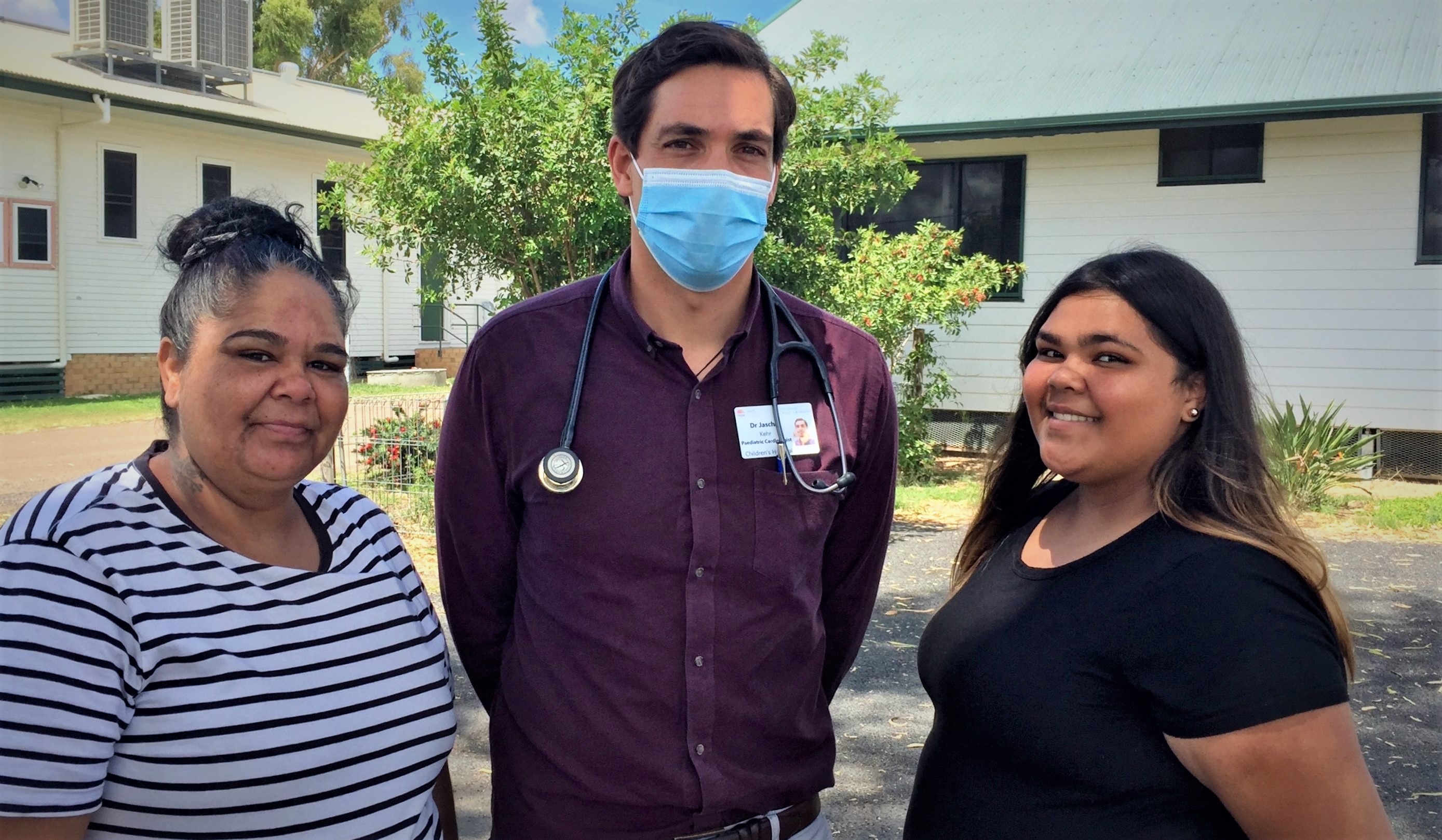 Dr Jascha Kher (centre) with Dayannah (right) and her mother Hannah (left)