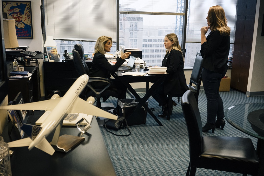  Sara Nelson, left, head of the flight attendants union, speaks with Taylor Garland, strategic public relations coordinator, in Washington.