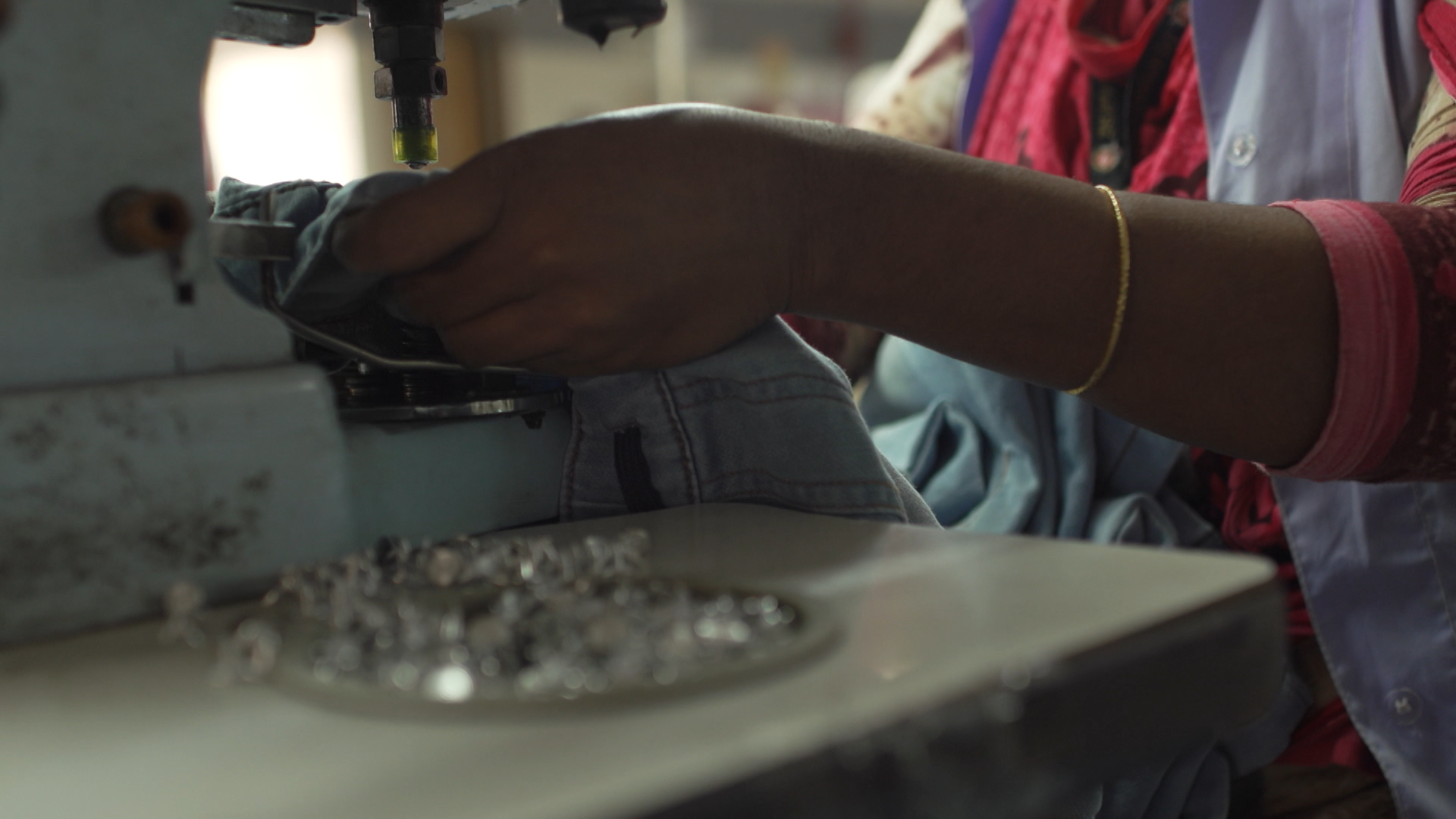 A garment worker in Dhaka, Bangladesh.