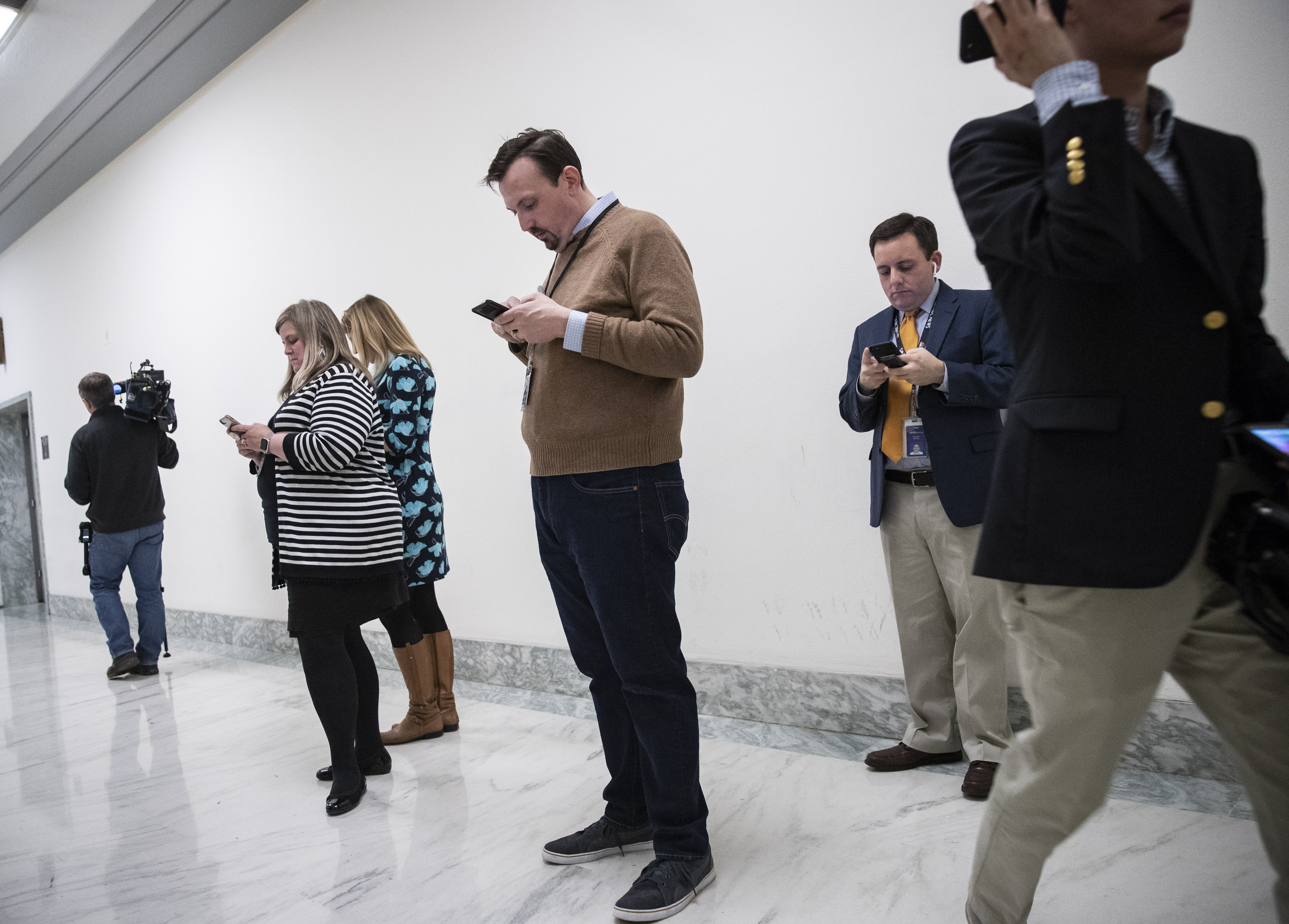 Journalists working at the House Judiciary Committee