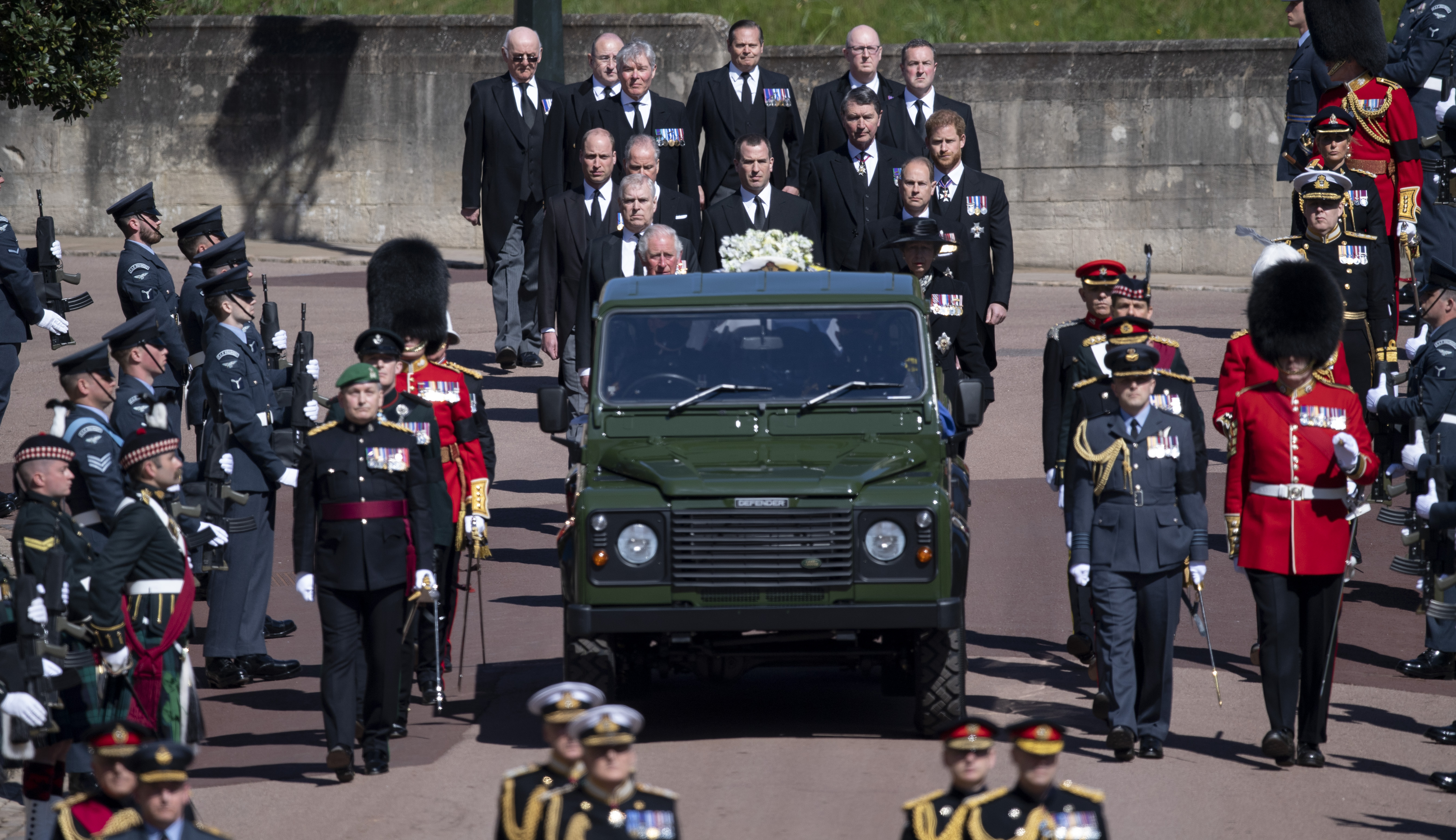 Queen Elizabeth bade farewell to Prince Philip at a funeral on Saturday that celebrated his seven decades of service.