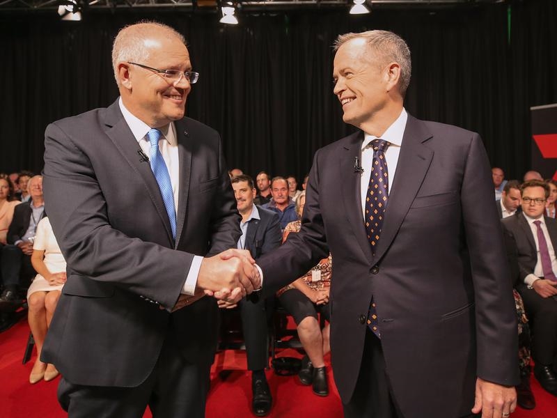 Scott Morrison and Bill Shorten shake hands before the first debate.