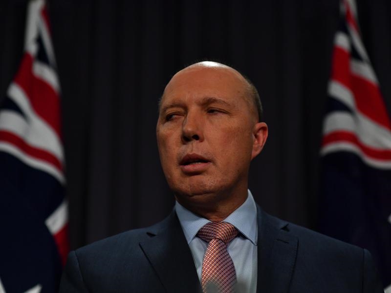Minister for Home Affairs Peter DuttonThe ABC and News Corp have requested Peter Dutton halt investigations against their journalists.