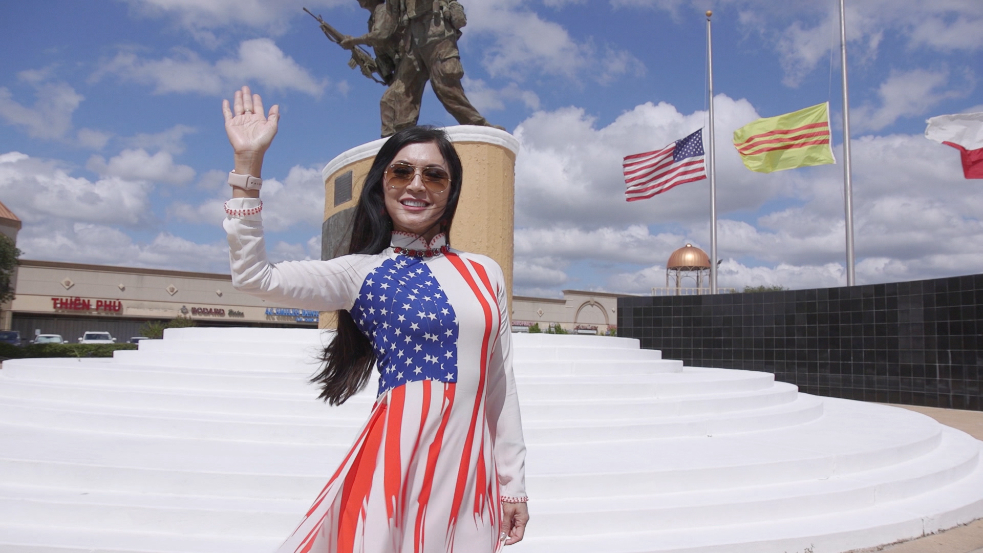 Lila Vu poses in an American flag dress.