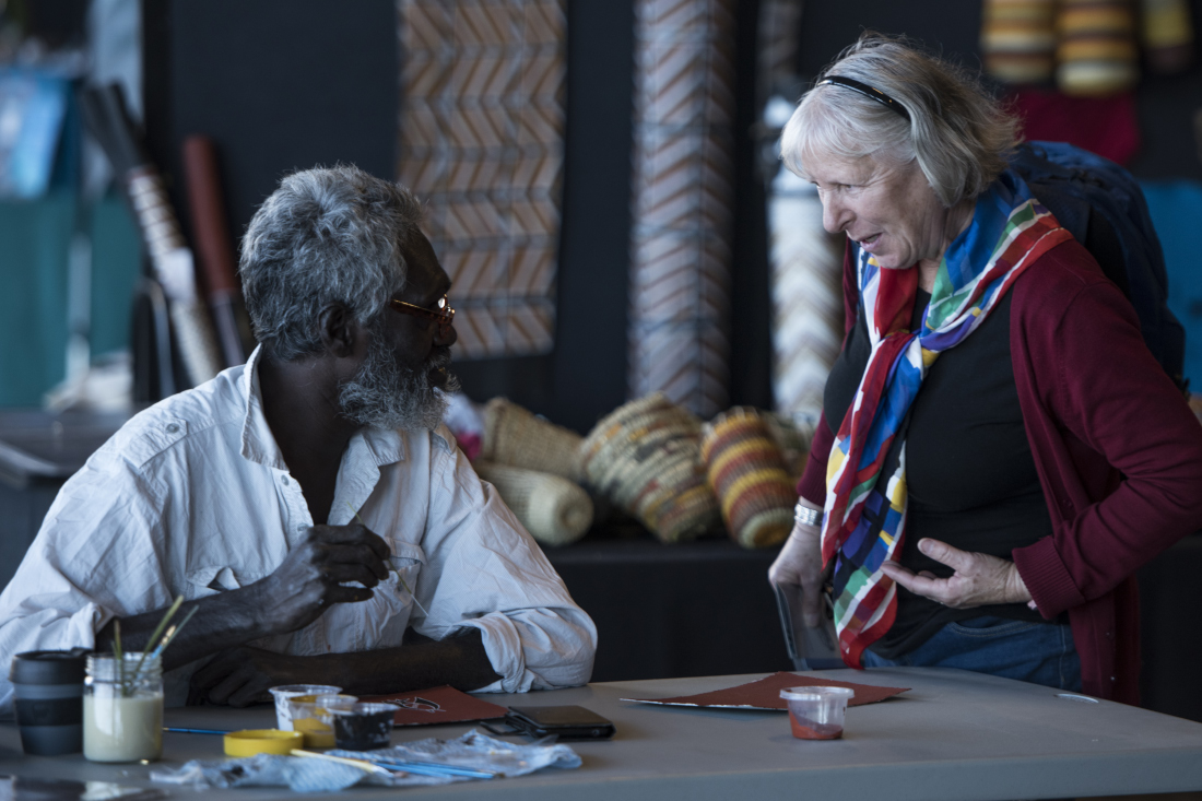 An artist speaks to a customer at last year's National Indigenous Art Fair.