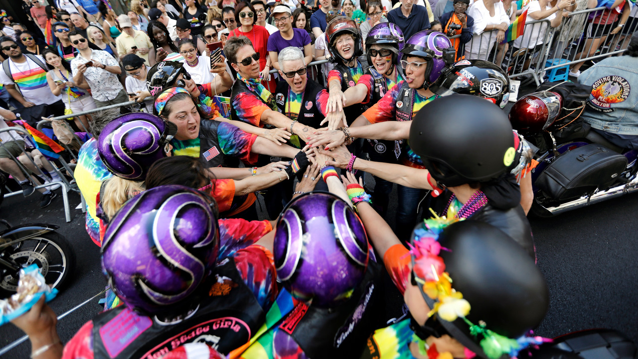 The Garden State Girls-Women on Wheels club gather before the LGBT Pride March in New York.
