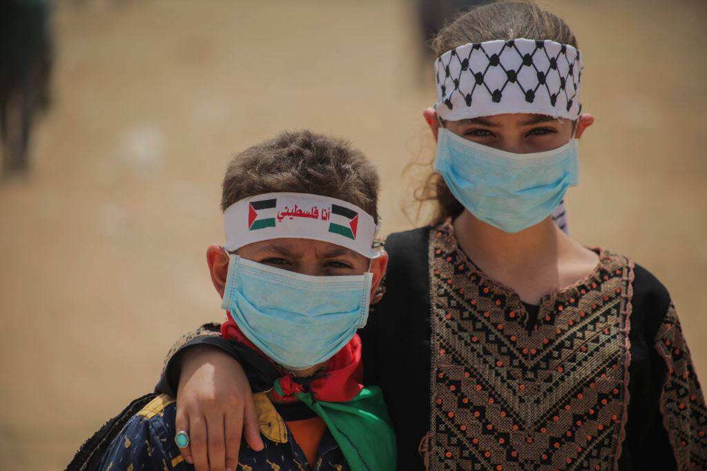 Palestinians during a protest demanding the right to return to their homeland, third consecutive week at the Israel border east of Jabalia in Gaza City.