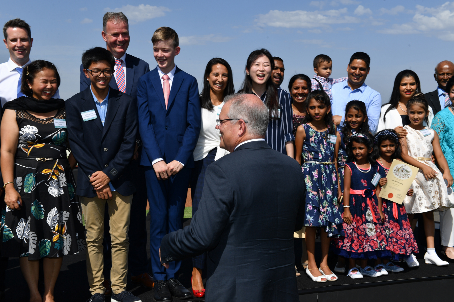 PM Scott Morrison with newly sworn in citizens at an Australia Day ceremony 