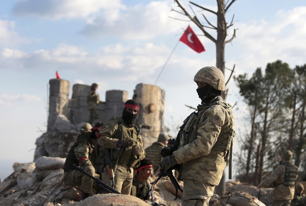 Pro-Turkey Syrian fighters and Turkish troops secure the Bursayah hill.