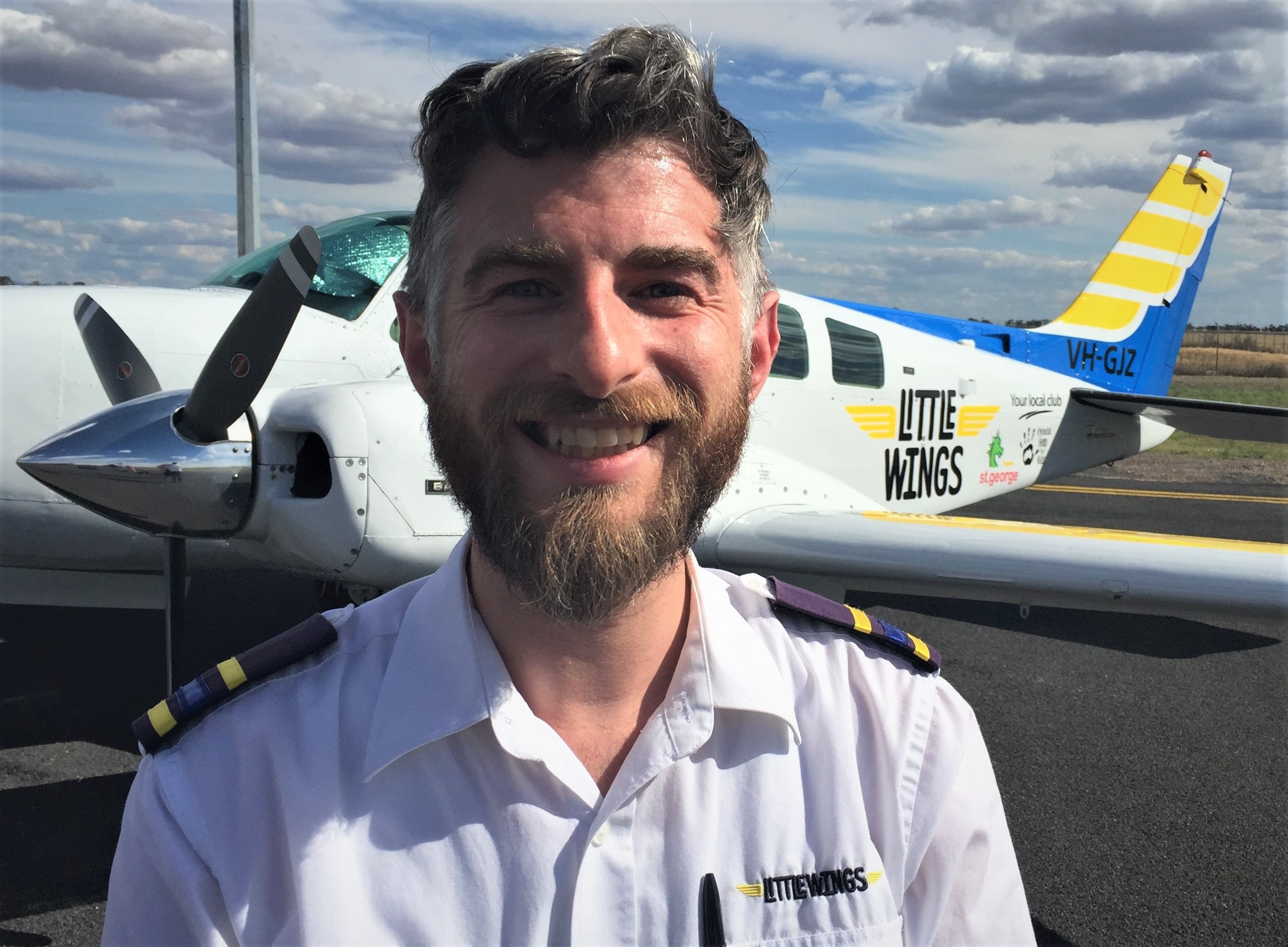 Pilot Tom Daniel volunteers with Little Wings. 