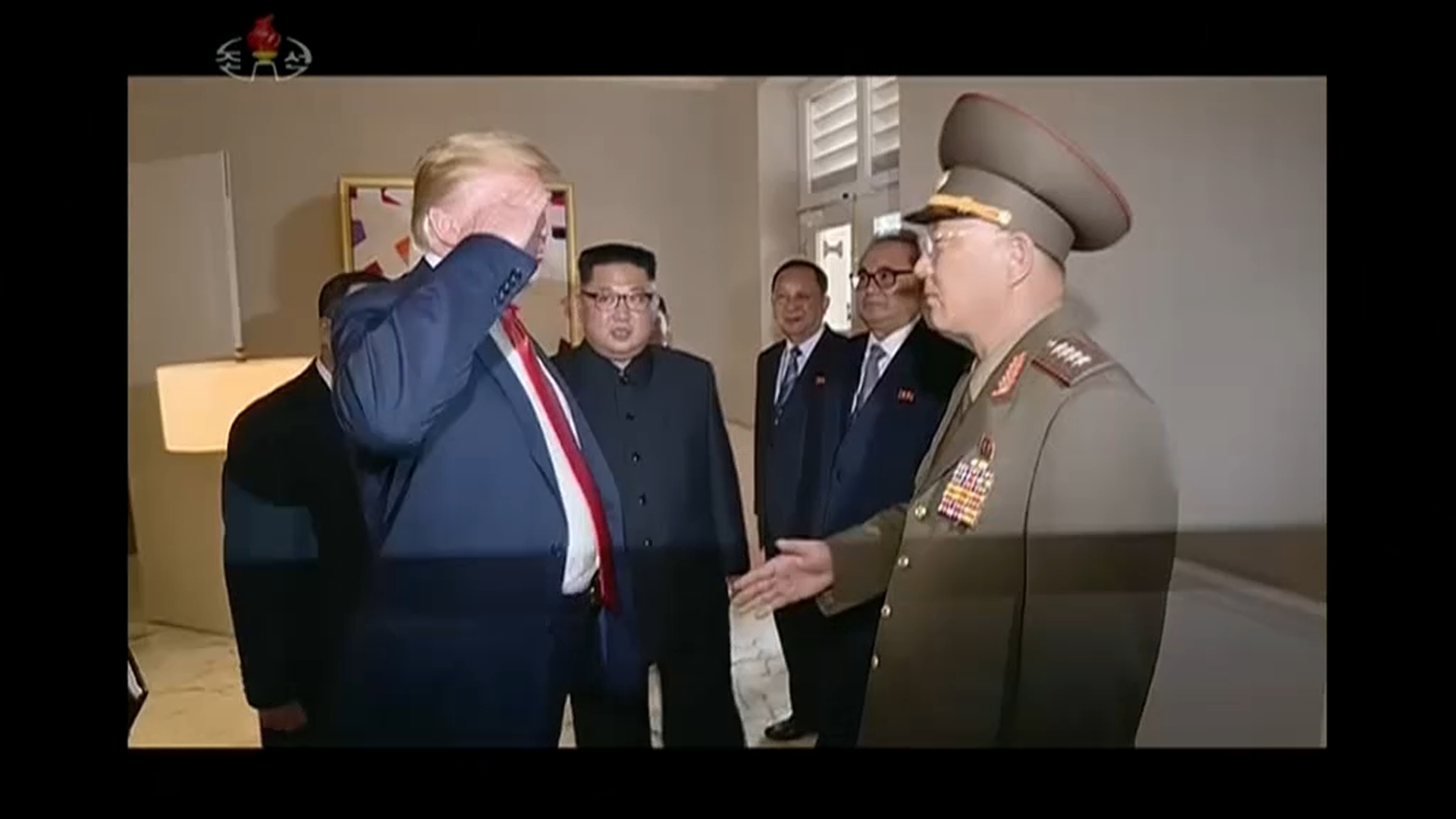 North Korea President Kim Jong-un introduces US President Donald Trump to uniformed North Korean official No Kwang Chol