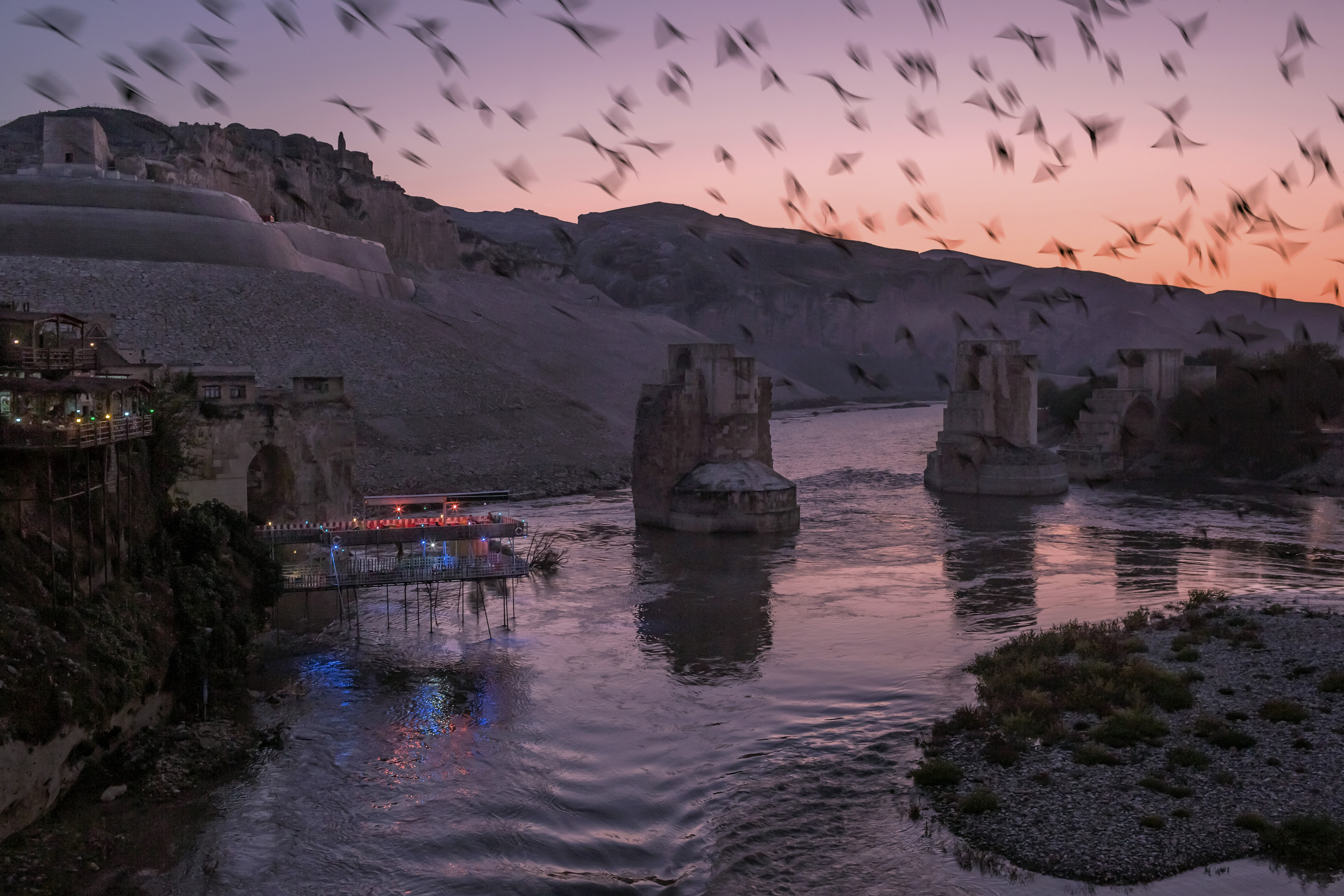 Birds fly over the Tigris River near Hasankeyf, Turkey, Nov. 3, 2019. 