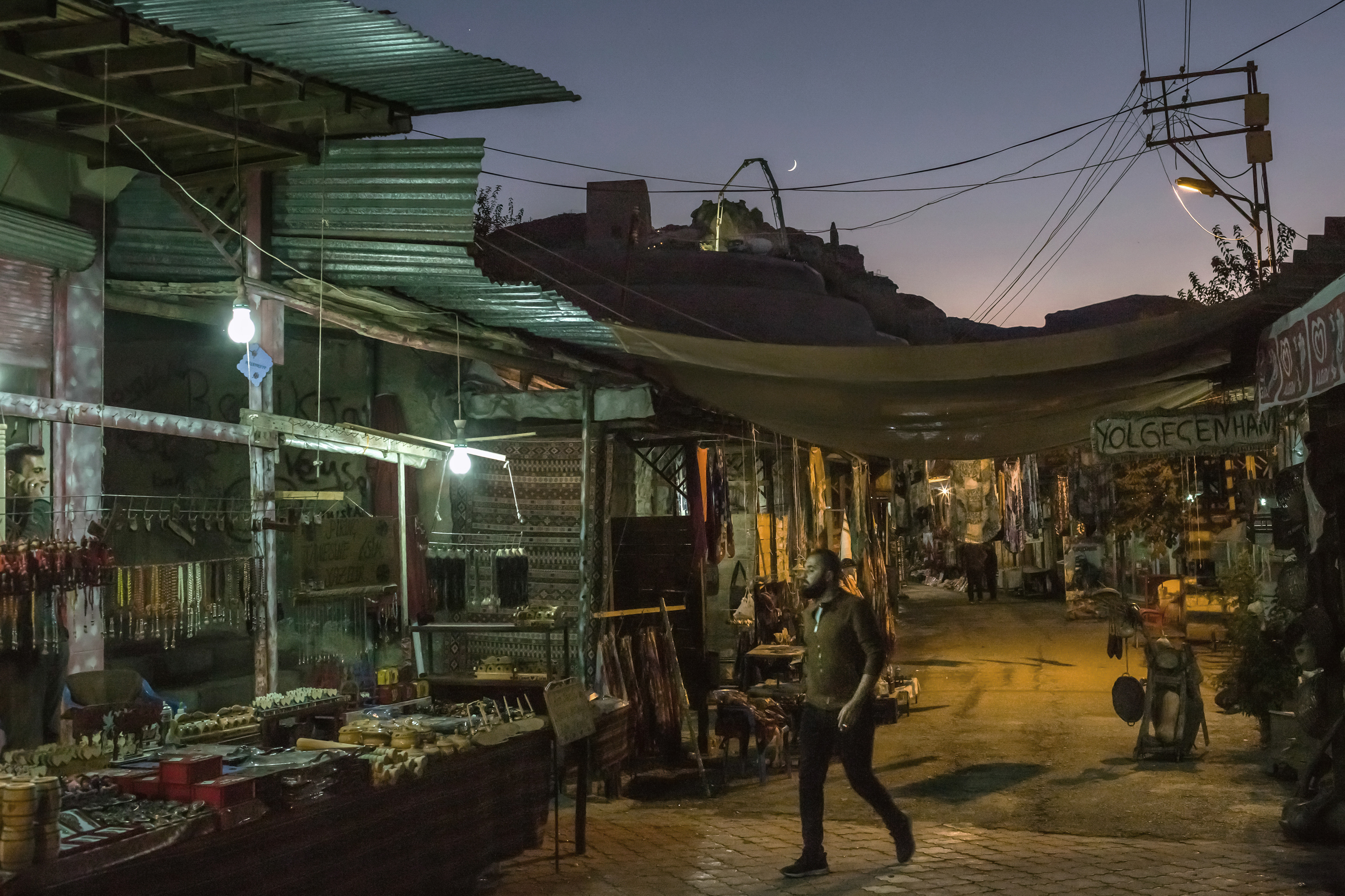 A resident walks through the old bazaar of Hasankeyf, Turkey, the day before demolition began on it, Oct. 30, 2019. 