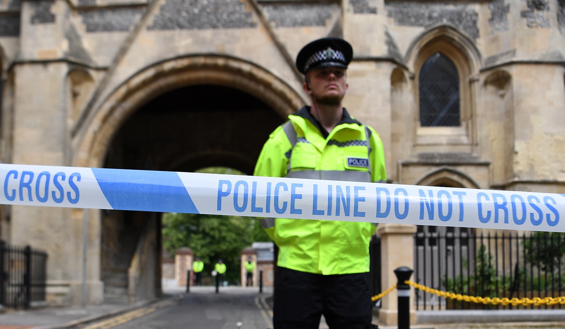 A police cordon close to the scene where three people were stabbed in Forbury Gardens in Reading, Britain.