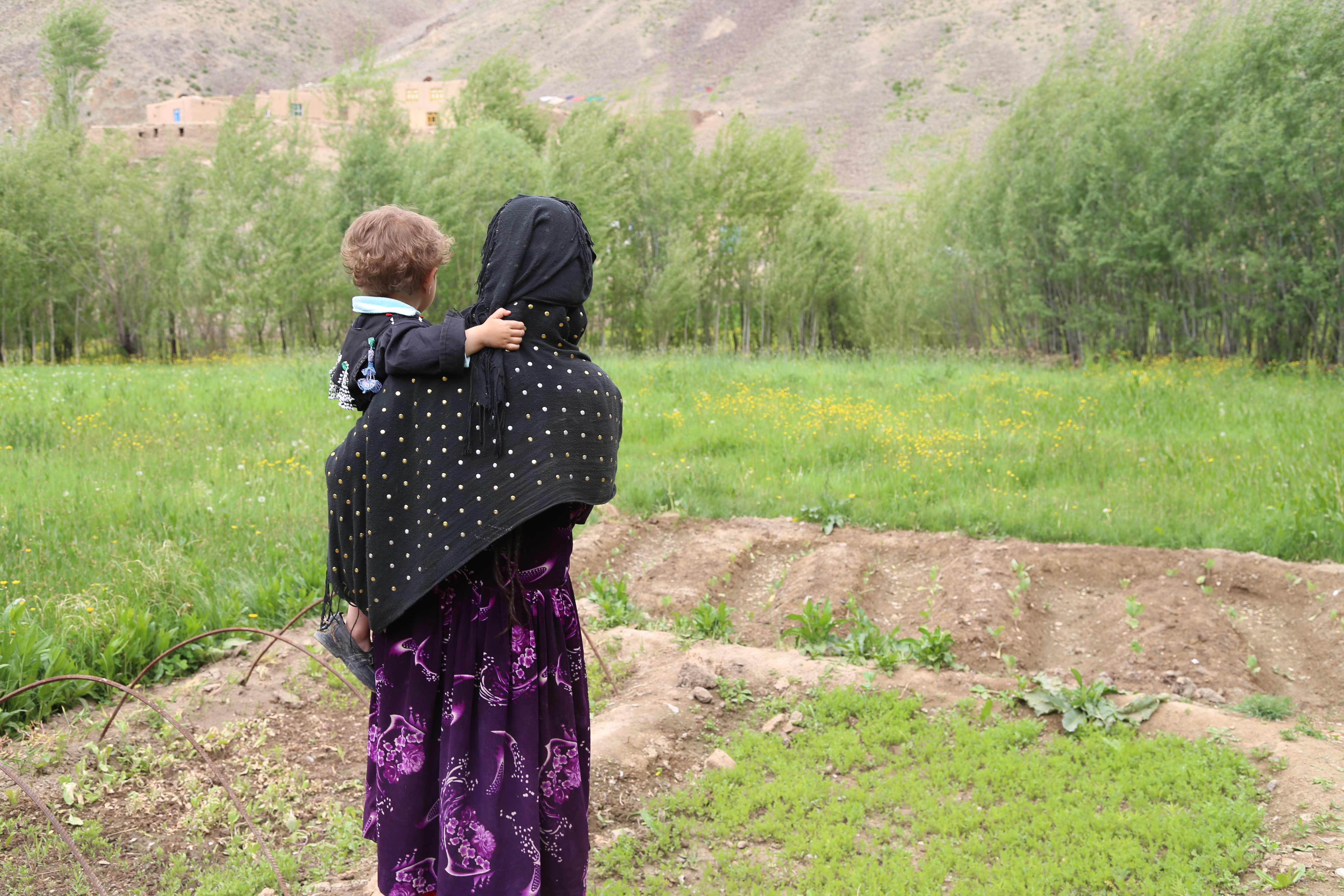 A child and woman in Afghanistan.