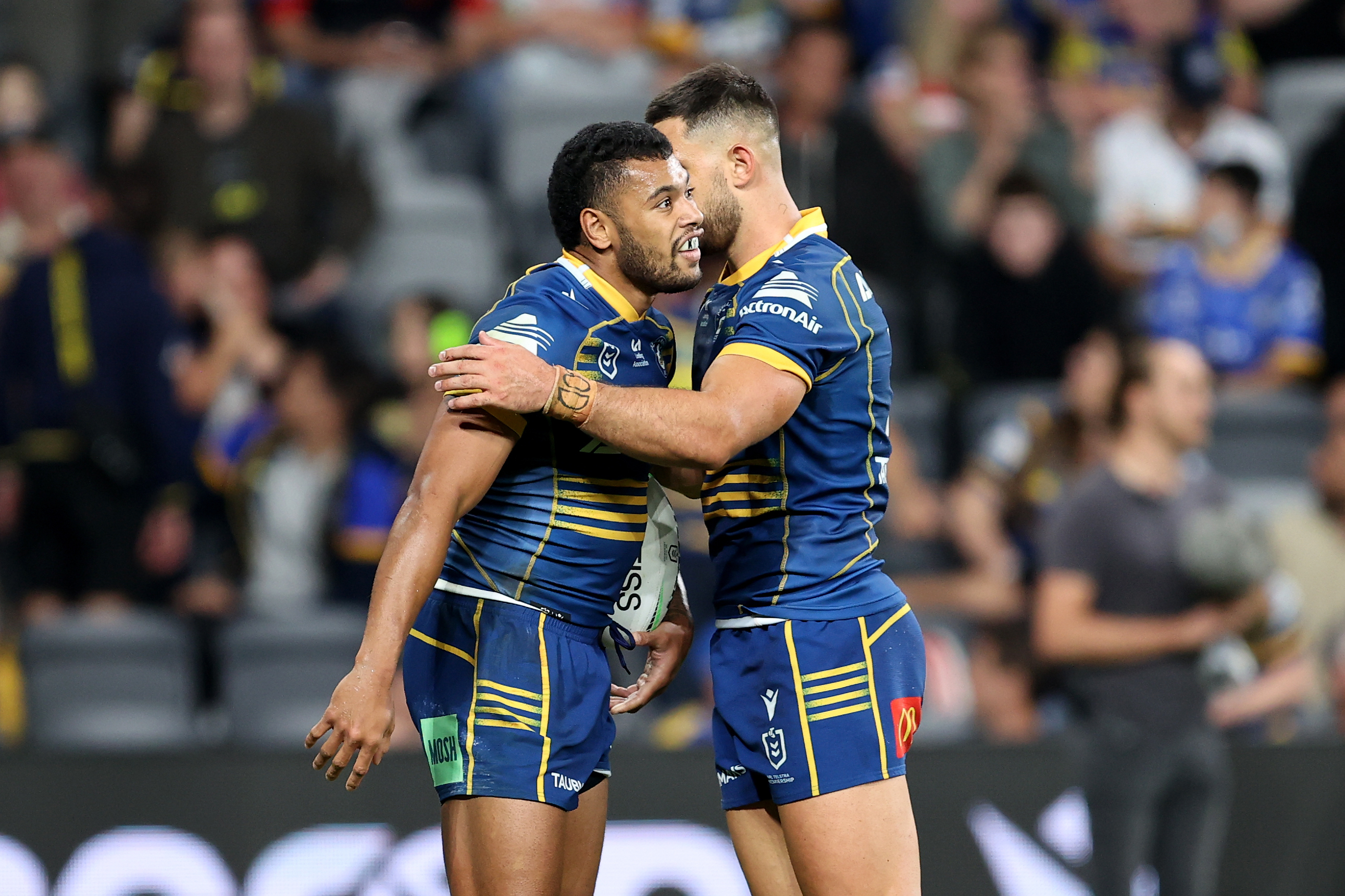 Waqa Blake of the Eels celebrates scoring a try with team mates during the NRL Round 4 match between Parramatta Eels and St George Dragons at CommBank Stadium in Sydney, Sunday, April 3, 2022. (AAP Image/Brendon Thorne) NO ARCHIVING, EDITORIAL USE ONLY