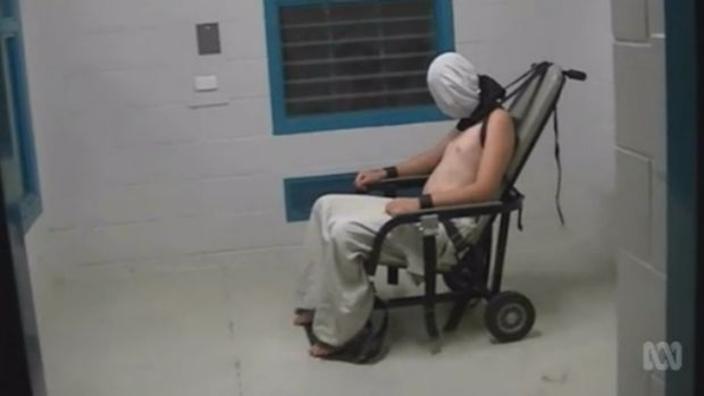 Still of Dylan Voller being inhumanely treated from the ABC Four Corners episode 'Australia's Shame'.