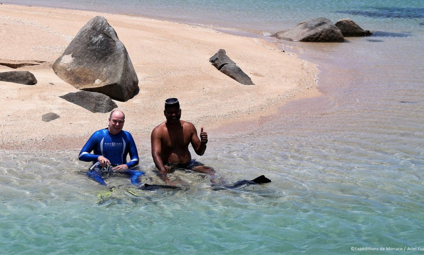 Prince Albert and Alick Tipoti diving off the coast of Badu Island