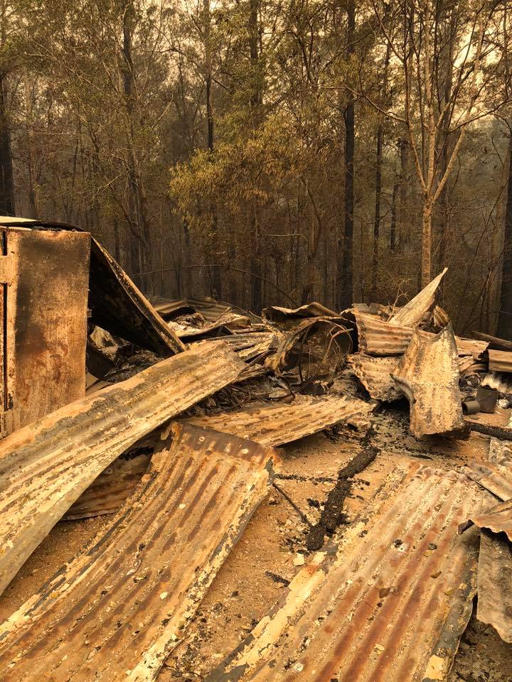 The remains of Paul Sefky's shed after bushfires tore through his property on NSW's mid-north coast.