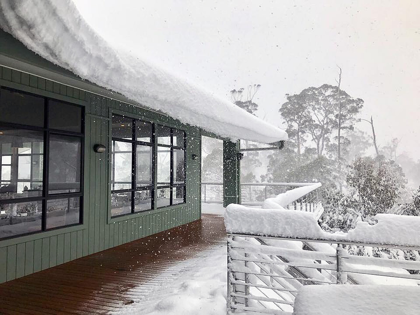 Supplied image of snow covering parts of the Cradle Mountain Hotel.