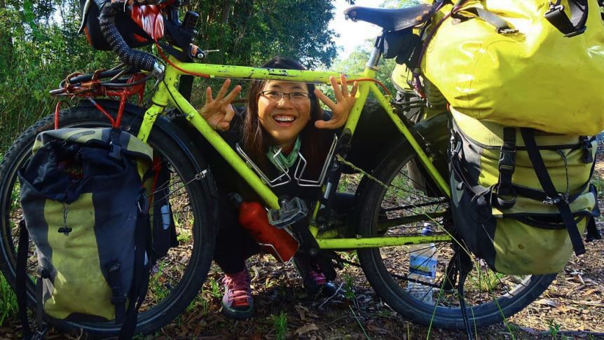A Korean woman pedaling in 74 countries over the past 9 years lands in QLD