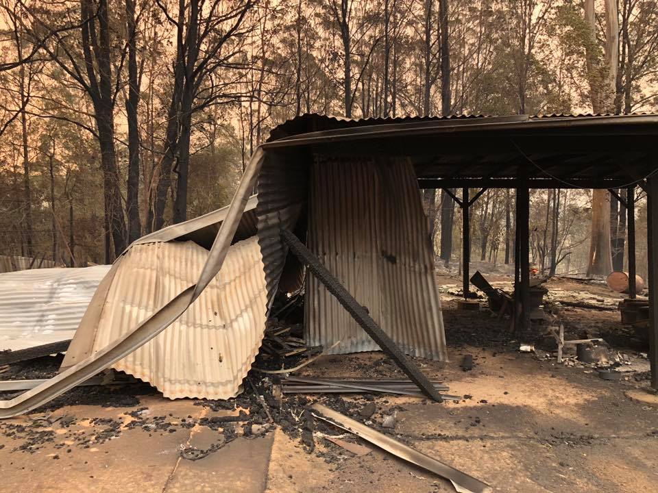 The Urunga Rural Fire Service saved Paul Sefky's home, but his sheds were lost in the blaze.