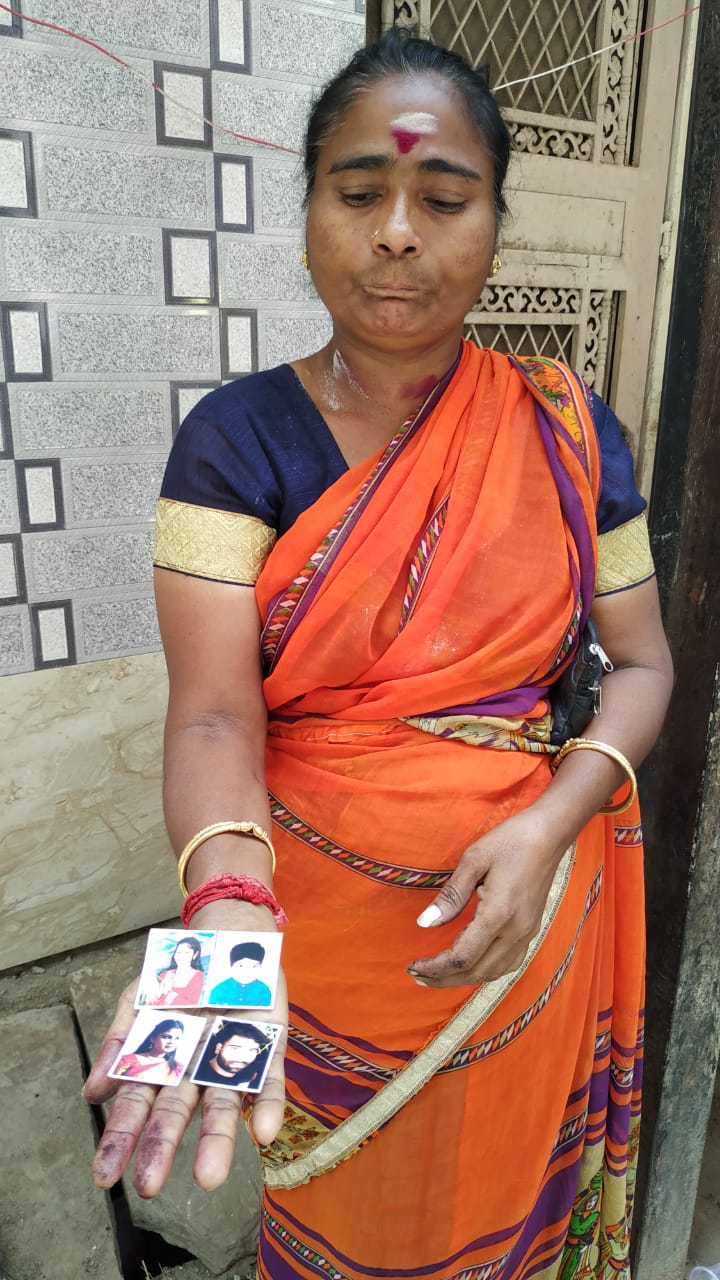 Kasturi showing photos of her family members in the boat