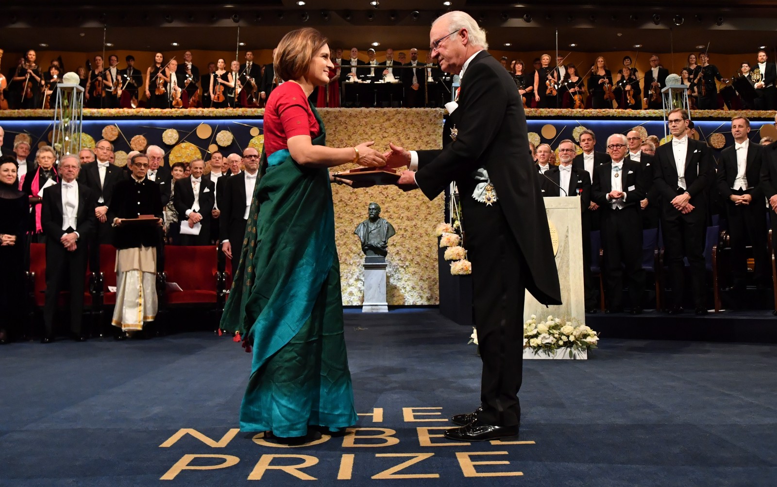 Esther Duflo and Prince Carl Philip during the Nobel Prize Awards Ceremony at Concert Hall on December 10, 2019 in Stockholm, Sweden.